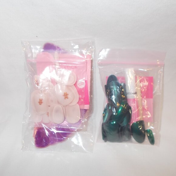 Two Olive and June nail kits. One gingerbread; one Christmas green. - Picture 2 of 4